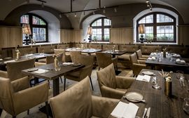 Modern interior of the new restaurant "Pfistermühle" in the Platzl Hotel.